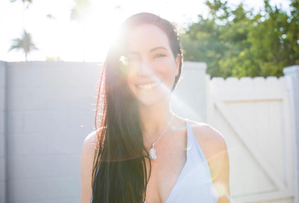 Image of woman in the sun, smiling