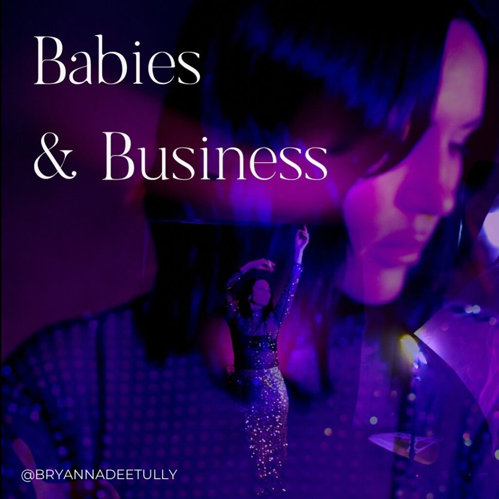 Image of woman arms up in the air. Overlayered text "Babies & Business"