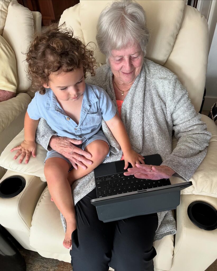 Image of aging woman holding baby